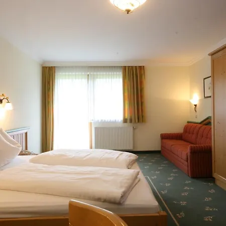 호텔 Alpenhotel Neuwirt 4*